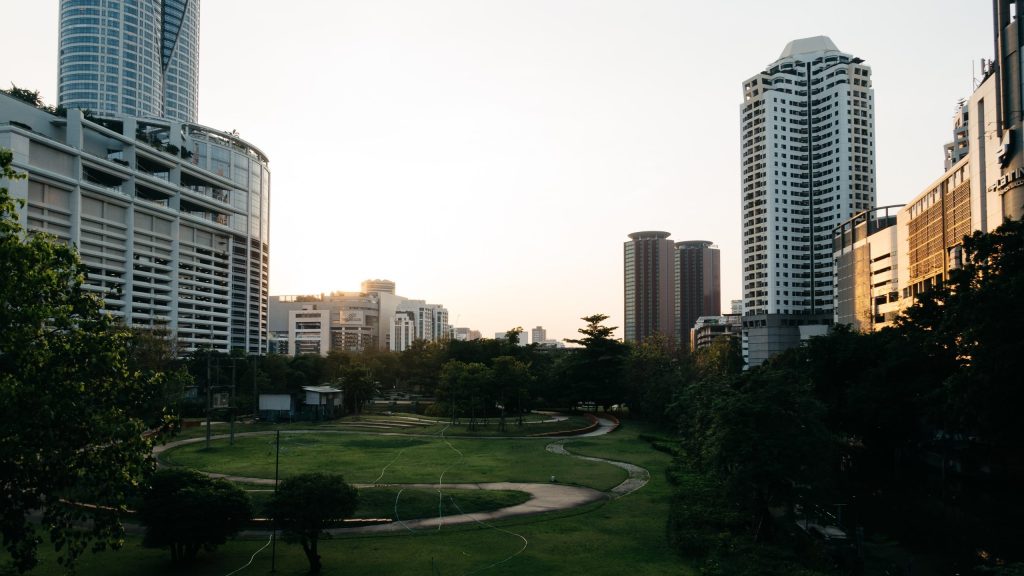 high rise buildings with green space