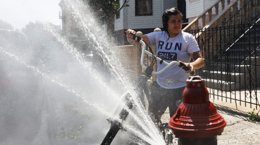 Why name and categorize heat waves?A girl cools off from the extreme heat from an opened fire hydrant in Brooklyn, New York, U.S.