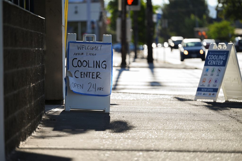 Image of a sign pointing to a local cooling center. Opening cooling centers is an action many cities take when heat becomes dangerous, especially if a heat wave is categorized.
