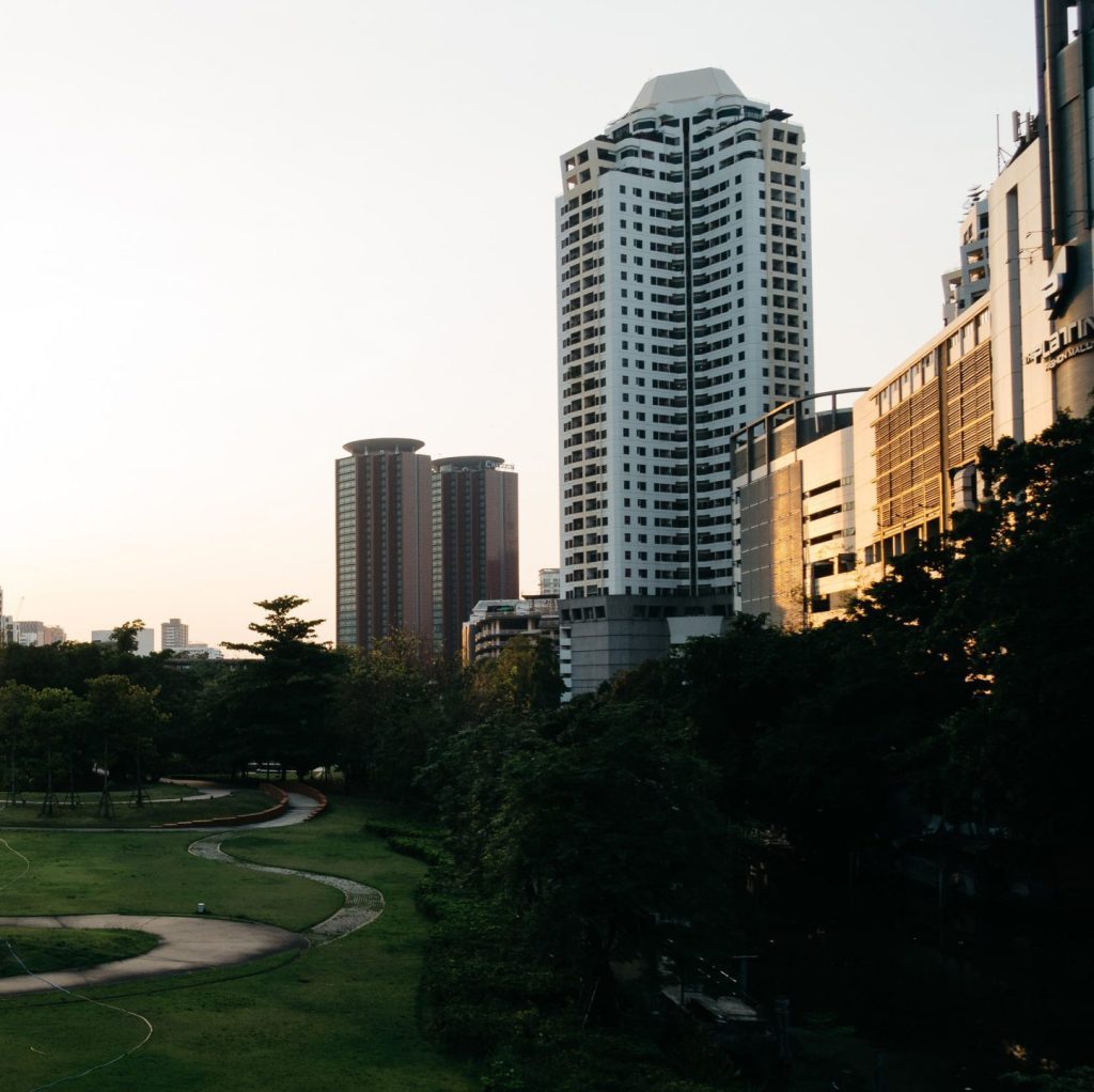 high rise buildings with green space